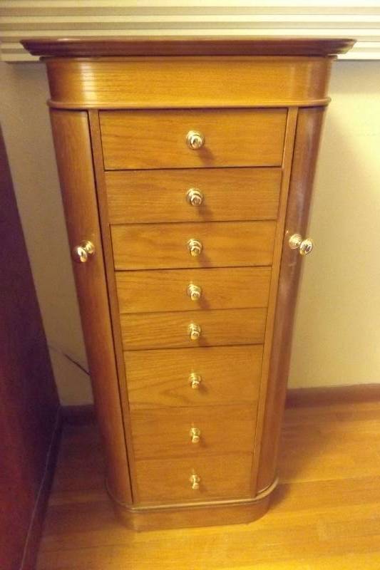 lot 202 image: Standing jewelry box with 8 drawers, 2 side necklace drawers, top lifts and has mirror
