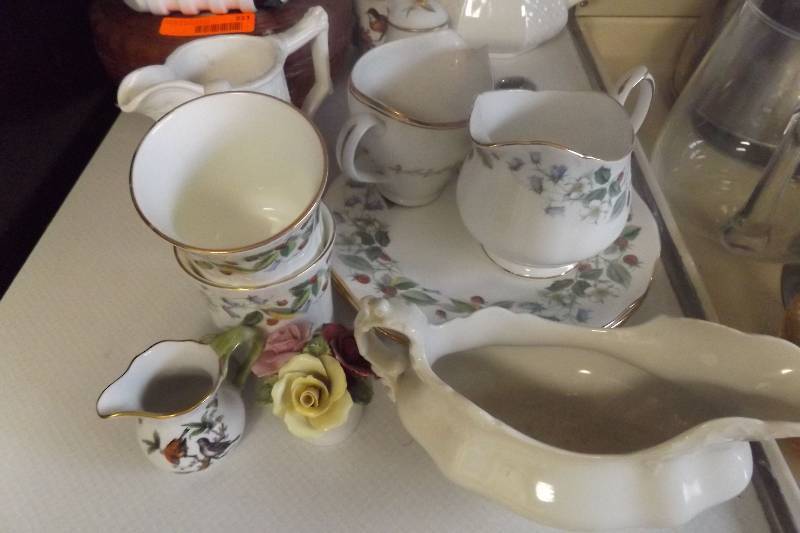 lot 212 image: Fine china, marked, small decorative pitcher, plates, cups, gravy boat