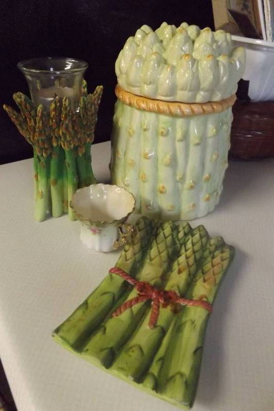 lot 217 image: Asparagus motif, canister, spoon holder, candle holder, small cup with similar colors