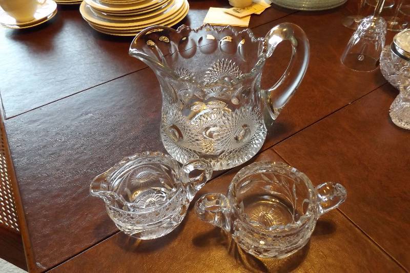 lot 245 image: Three heavy crystal pieces, including pitcher with flowers