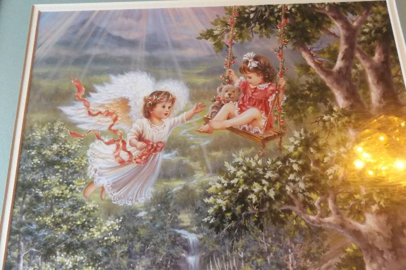 lot 254 image: Girl on swing with angel, Home and Garden Party wall hanging