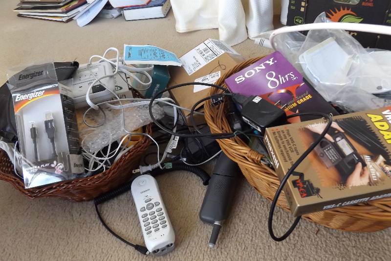 lot 300 image: Electronics pieces including ports, car jacks, wire, Sony camera, cell phones