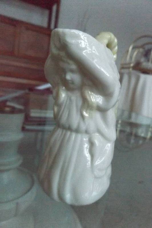 lot 498 image: Belleek china small pitcher in shape of kneeling girl with blonde hair