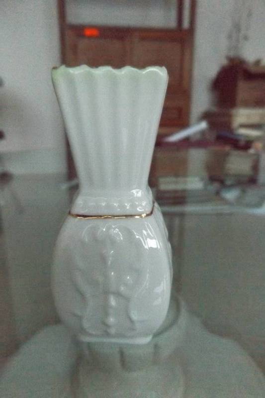 lot 499 image: Belleek china small vase with light green edging at top