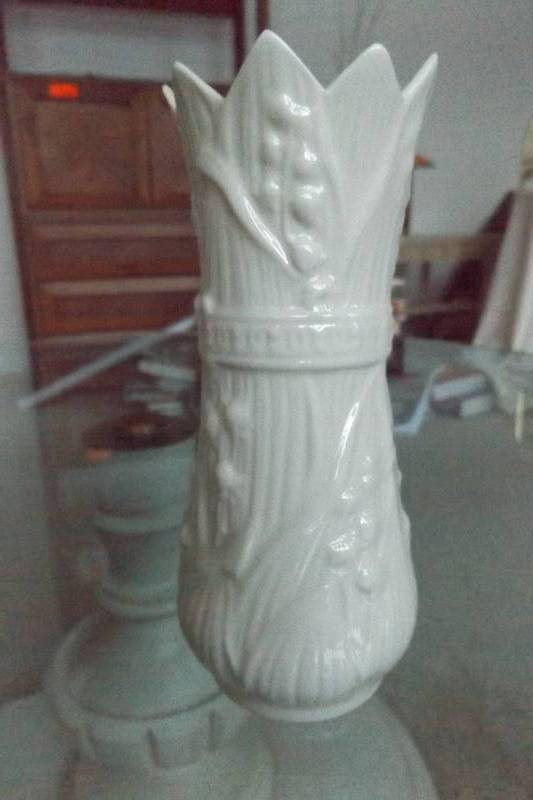 lot 500 image: Belleek china vase with pointed edged at top, yellow enamel within