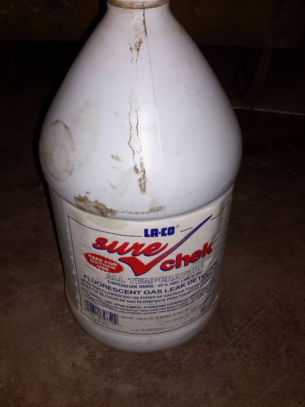 lot 147 image: Hand warmers, Bottle of SURE CHECK, Fluorescent gas leak detector