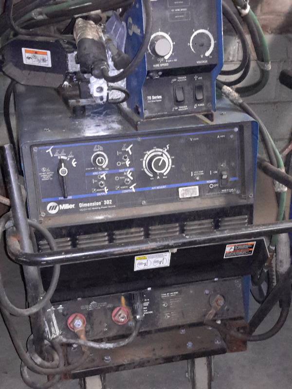 lot 11 image: Miller Dimension 302 Welder with  70 Series 24V Wire Feeder