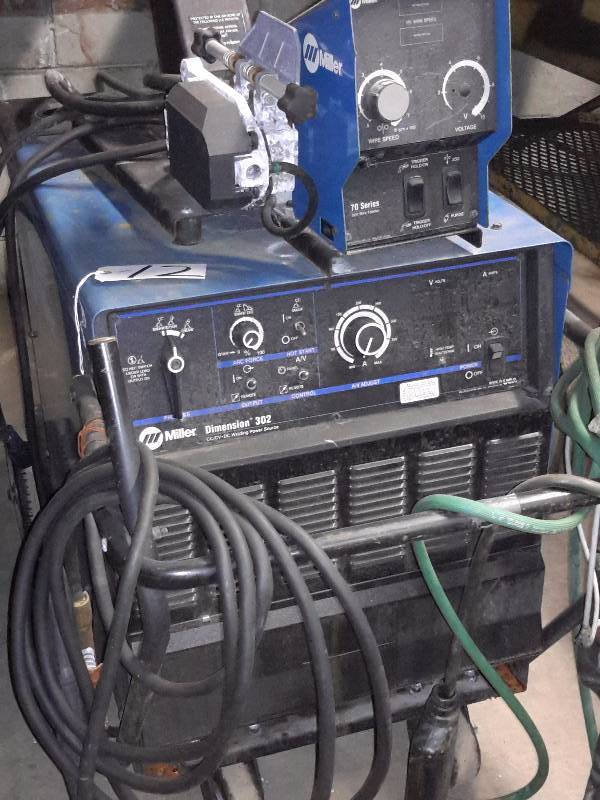 lot 12 image: Miller Dimension 302 Welder with  70 Series 24V Wire Feeder