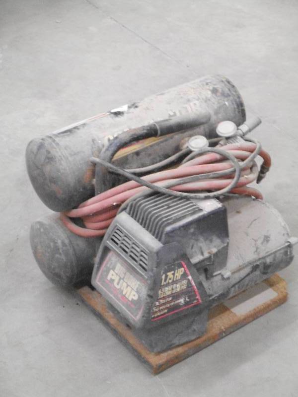 lot 11 image: Coleman 1.75HP Contractors Twin Tan...