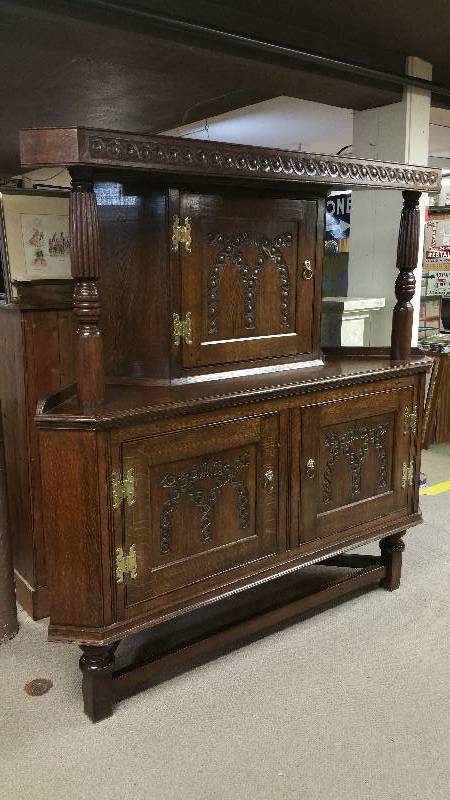 lot 22 image: Early English Carved Oak Corner Cabinet