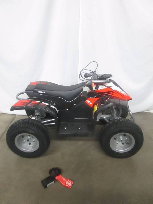 lot 5 image: Razor Dirt Quad Electric Off-Road Vehicle