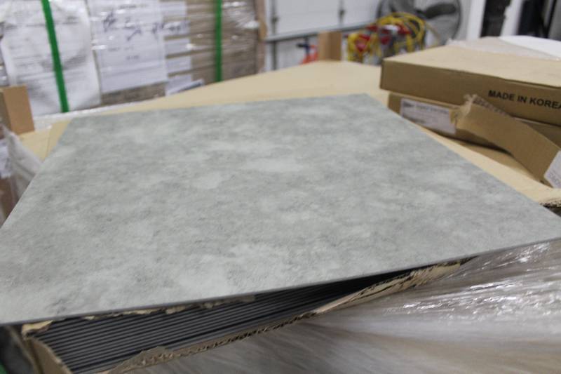 lot 32 image: 12 Pallet Lot of (Approximately 26) Boxes of Matworks 18x18in. Vinyl Tile