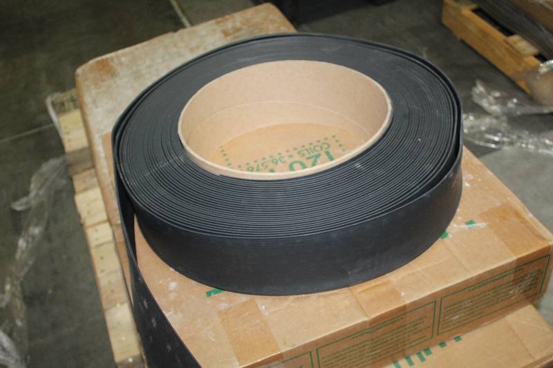 lot 86 image: Pallet Lot of (5) Boxes of 120ft. Black Pinnacle Rubber 18in. Coil Baseboard