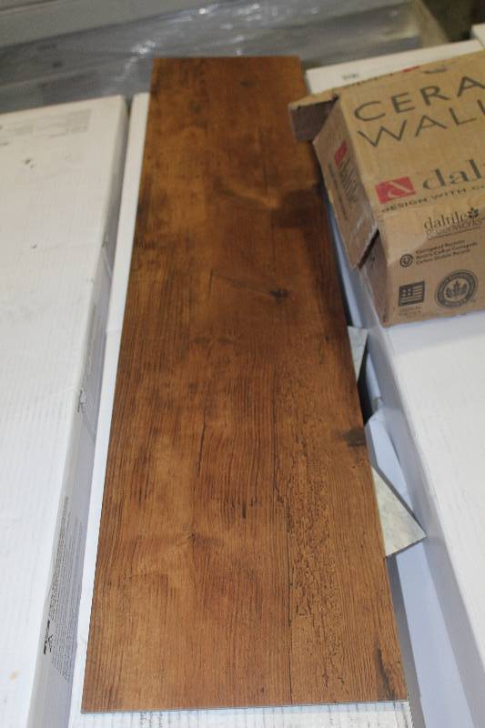 lot 103 image: Pallet Lot of (17) Boxes of Armstrong Commercial Natural Creations 36x8in. Weathered Oak Golden Brown Wood Vinyl Flooring