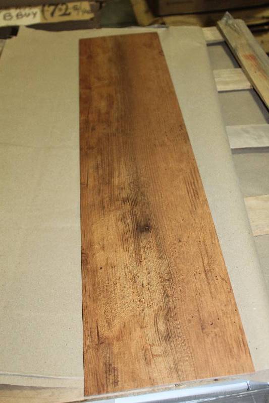 lot 109 image: Pallet Lot of (8) Boxes of Armstrong Commercial Natural Creations 36x8in. Weathered Oak Golden Brown Wood Vinyl Flooring
