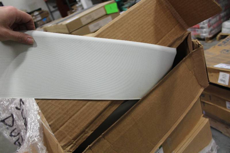 lot 141 image: 12 Pallet Lot of (9) Boxes of Mannington 18in. Oyster White Vinyl Cove Roll
