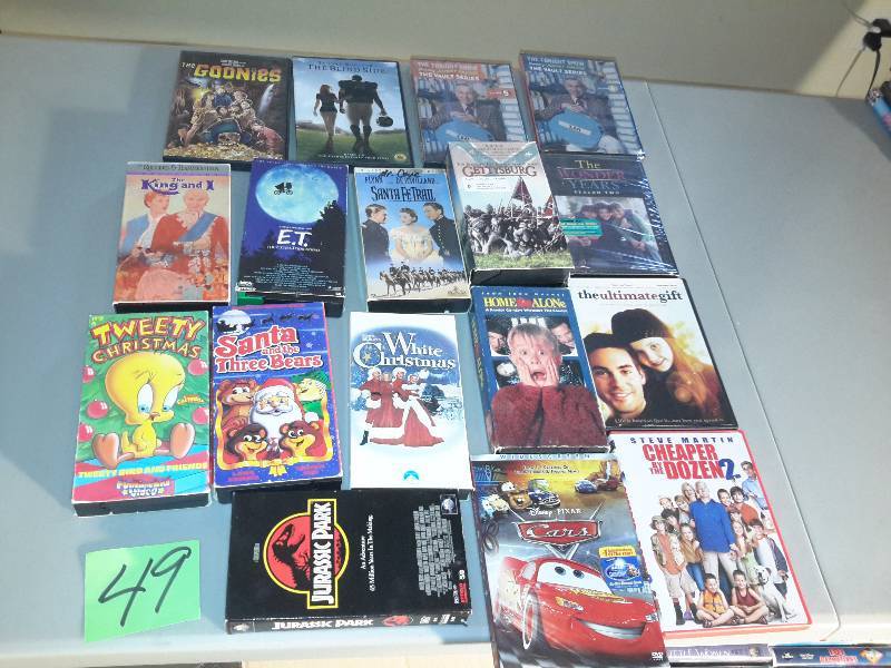 lot 49 image: DVDs and VHS Tapes as shown