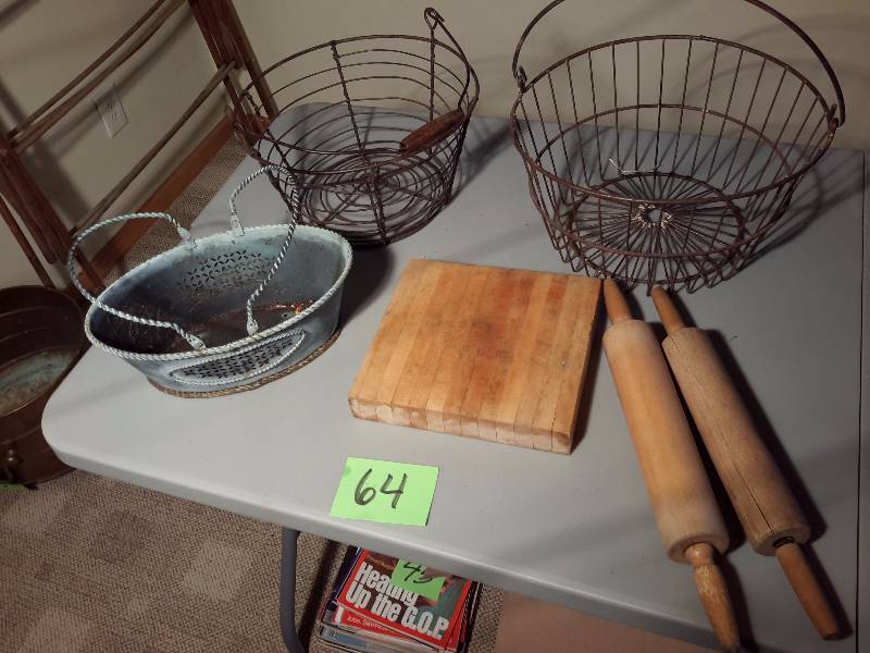 lot 64 image: 2 Egg baskets and other metal basket.. Butch block cutting board and 2 wooden rolling pins