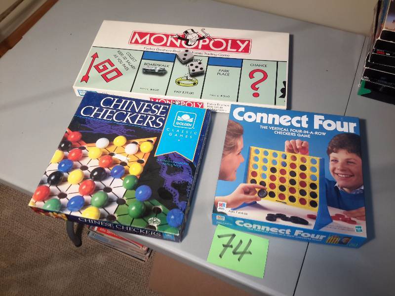 lot 74 image: Games as shown.. Monopoly and Connect Four look complete.   Chinese checkers are missing a few marbles