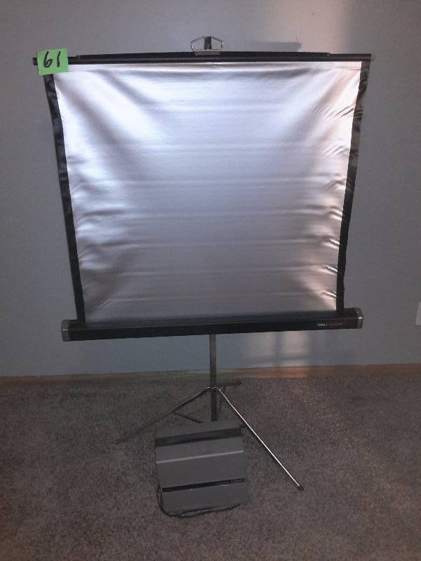 lot 61 image: Bell and Howell Projector and Screen.. Tested and works