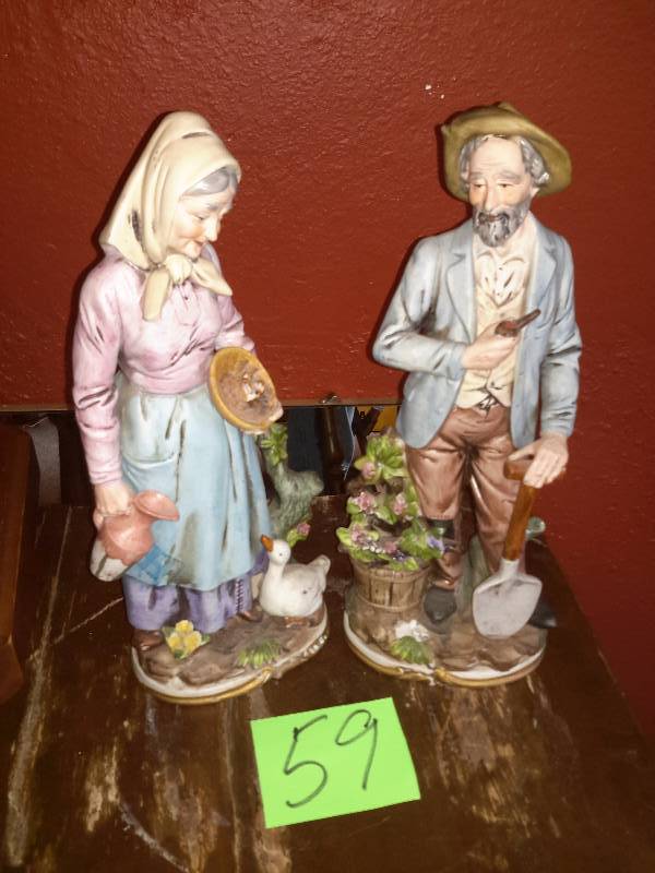 lot 59 image: 2 Homi Statues as pictured.. About 12 in