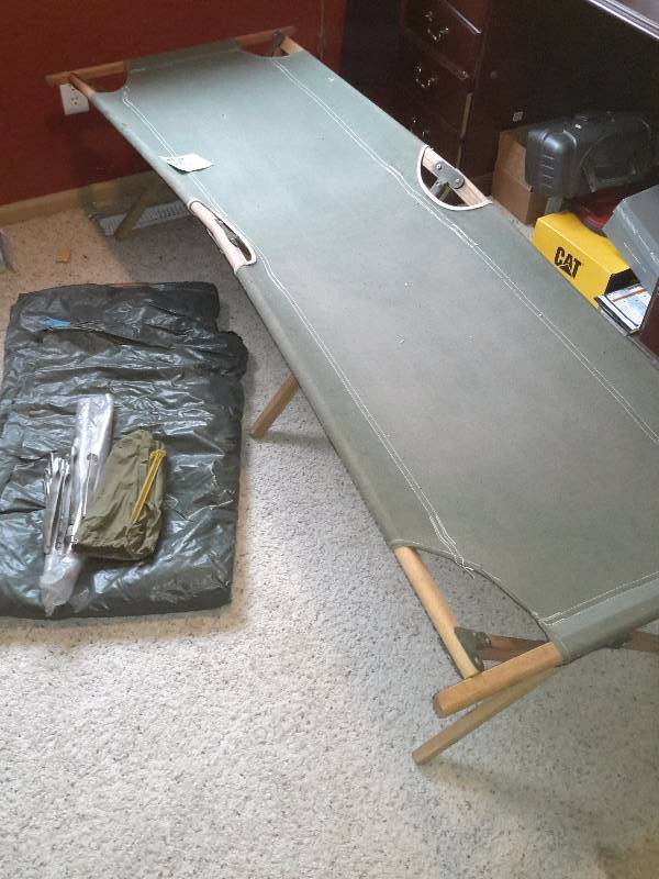 lot 78 image: Nice Canvas Army Cot and what looks like a two person tent.
