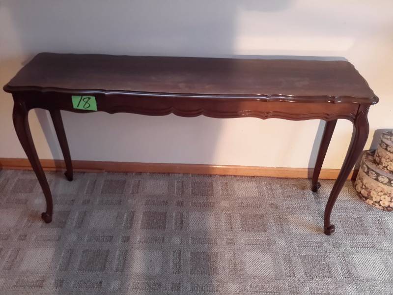 lot 18 image: Solid wood sofa table.. Looks like walnut