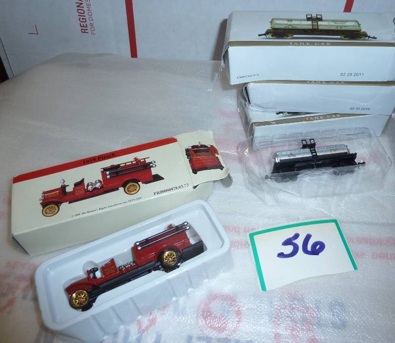lot 56 image: 3 new model train Tank Cars and 1 F...