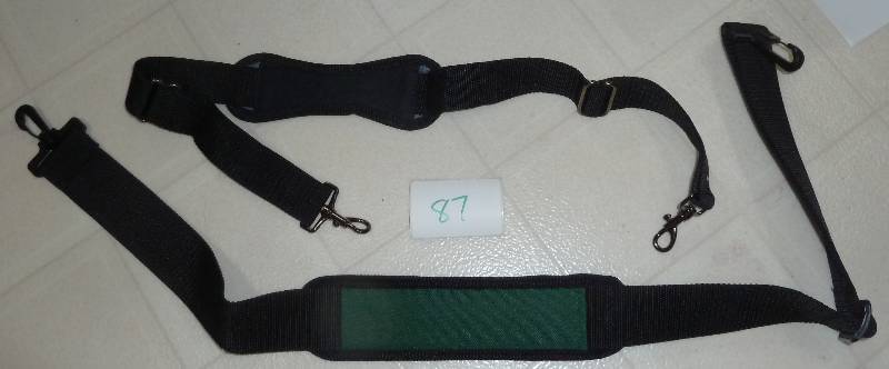 lot 87 image: 2 straps - one came off a gun case ...