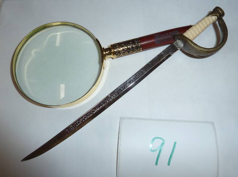 lot 91 image: History Channel magnifying glass an...