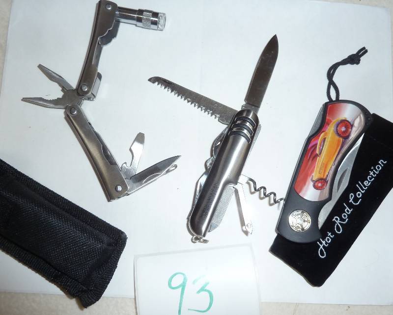 lot 93 image: 2 multi tool knives and a hot rod c...