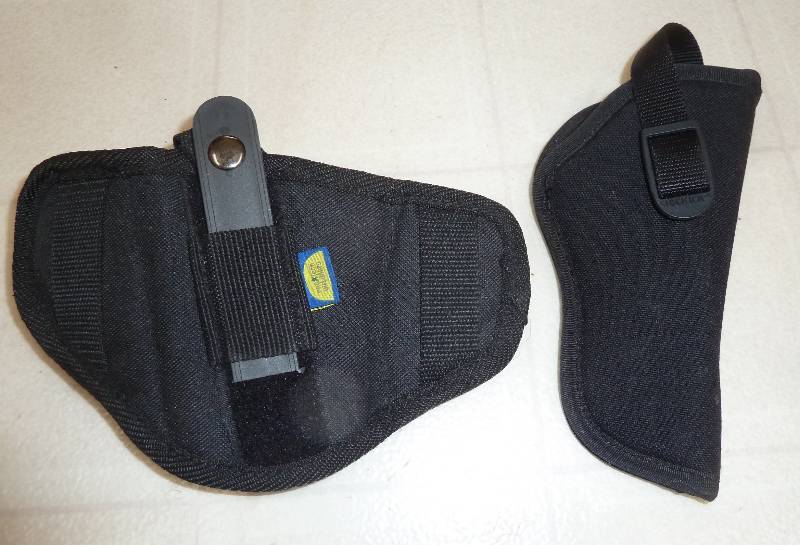 lot 97 image: Two pistol holsters Uncle Mikes siz...