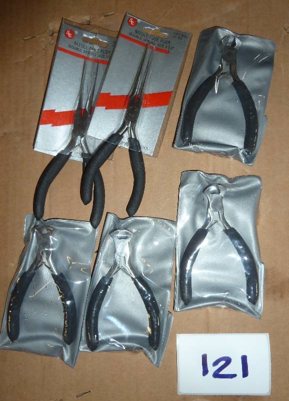 lot 121 image: 2 needle nose plier and 4 snub nose...