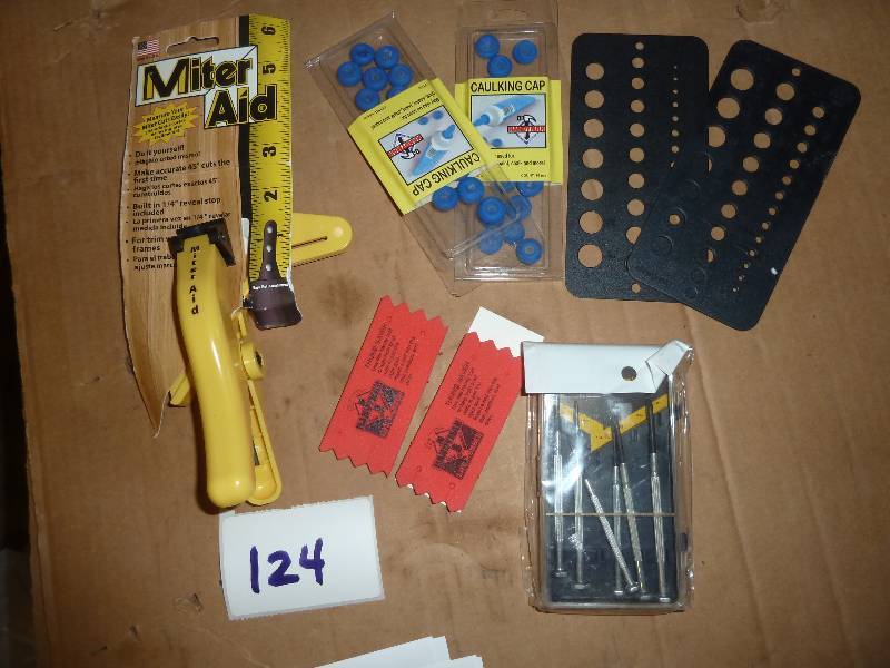 lot 124 image: handyman lot - miter aid, caulk cap...