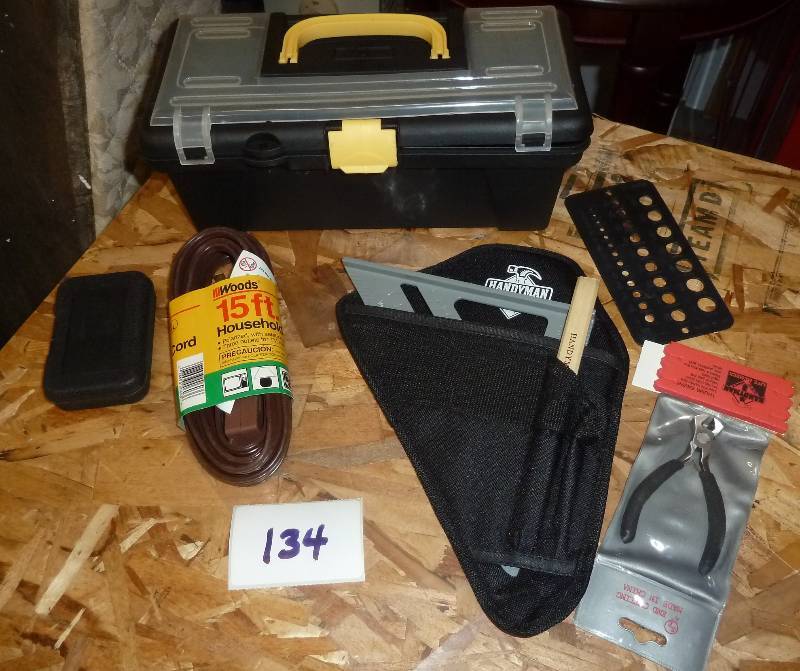 lot 134 image: Tool box, 15 ft extension cord, spe...