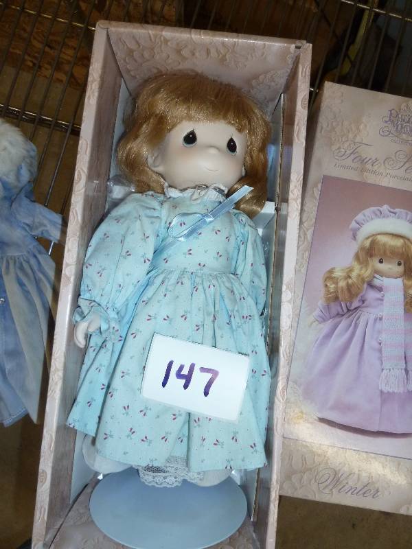 lot 147 image: Precious moments doll winter  Fad...