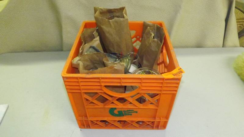 Crate of oil lamp parts