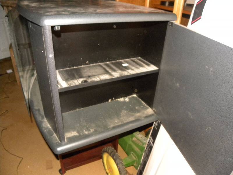 Black TV stand with built in dvd holder