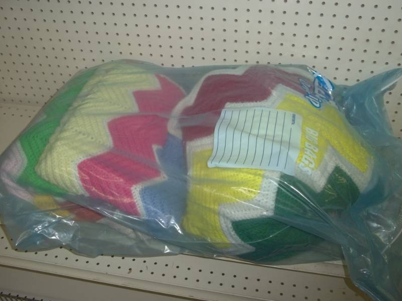 lot 11 image: Large bag of knitted blankets