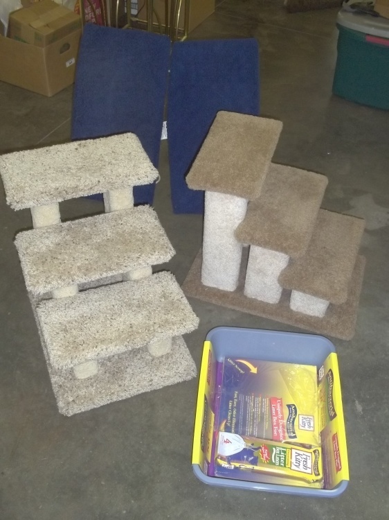 lot 24 image: Pair of cat scratching posts, cat window seats and litter box