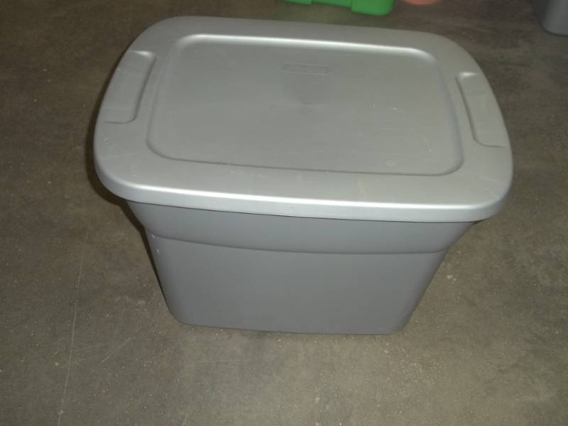 lot 30 image: Storage tote with greenery