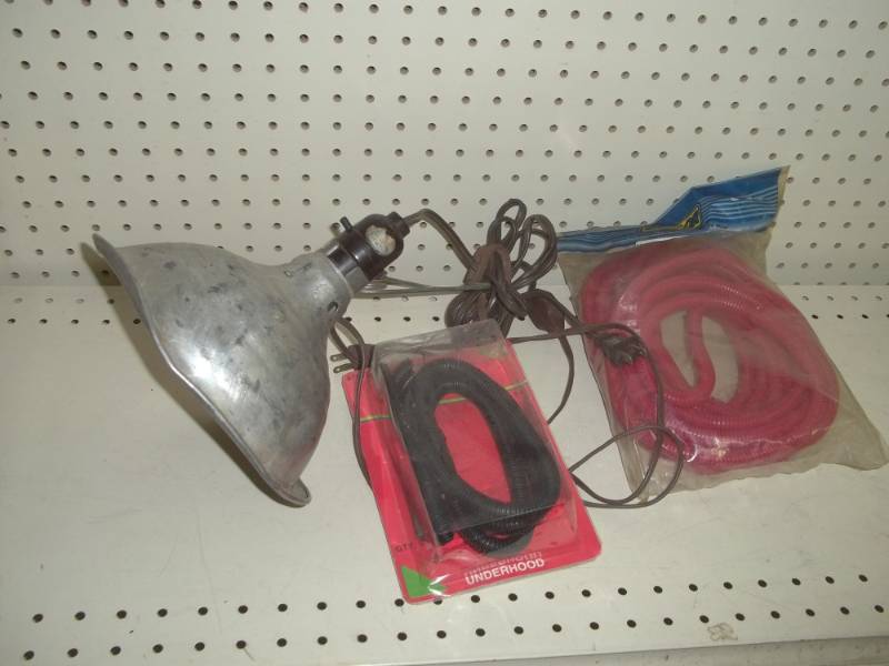 lot 72 image: Cord protectors and hanging clamp on light