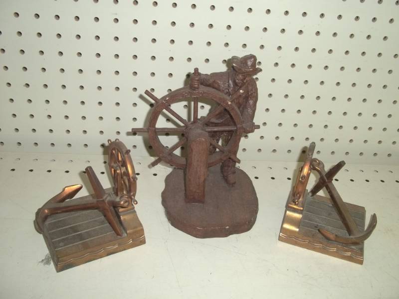 lot 96 image: Brass bookends, Sailor plus sailor dcor