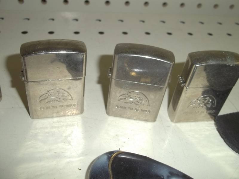 lot 103 image: Group of lighters with cases