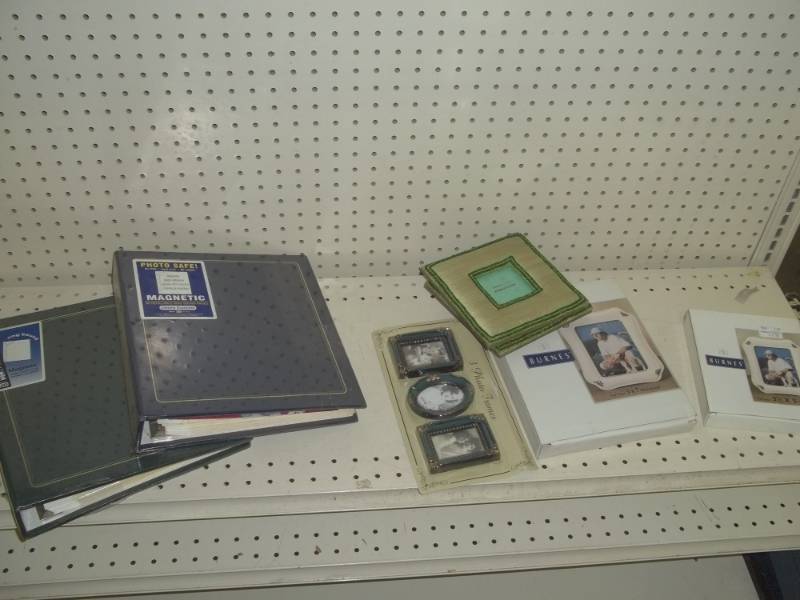 lot 120 image: Picture albums and picture frames
