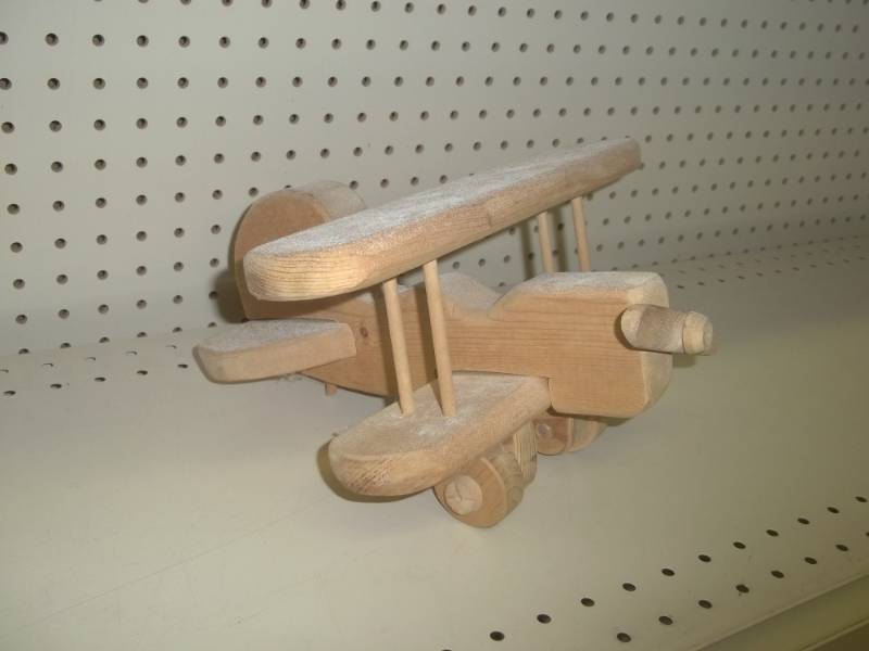lot 127 image: Wood airplane