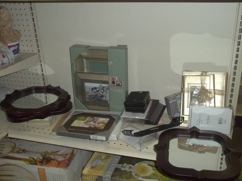 lot 143 image: Picture frames, mirrors and photo albums