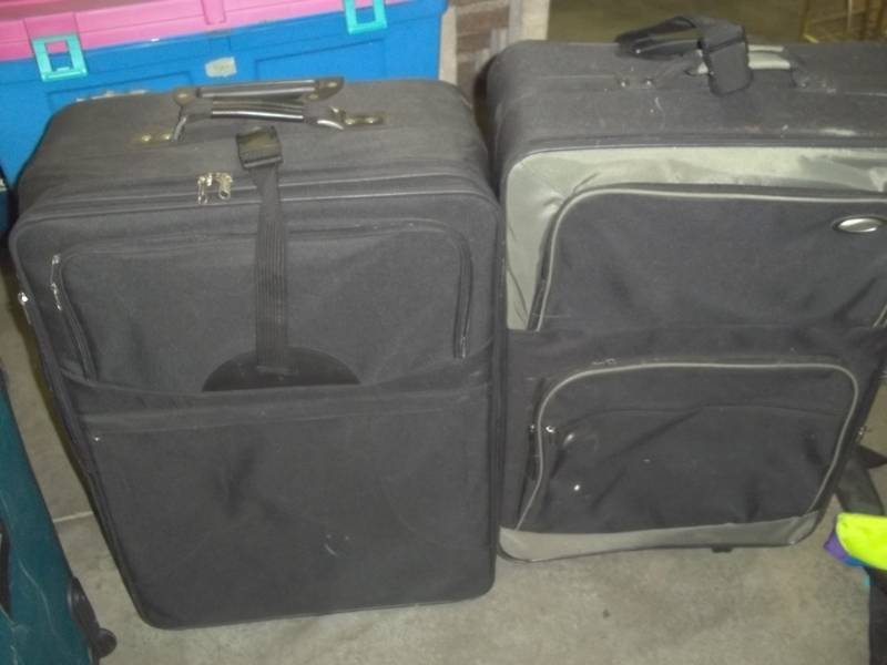 lot 179 image: Pair of Black Suitcases with wheels