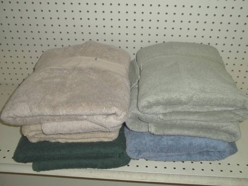 lot 186 image: Lot of Blue, Gold, and Green towels