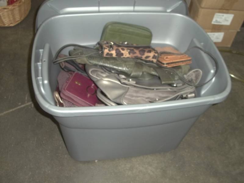 lot 196 image: Gray Tote with purses and billfolds